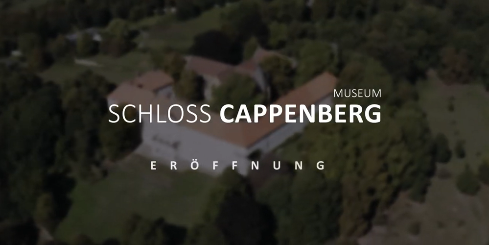 Der Titel "Museum Schloss Cappenberg: Eröffnung". Im Hintergrund eine verschwommene Luftaufnahme vom Schloss.